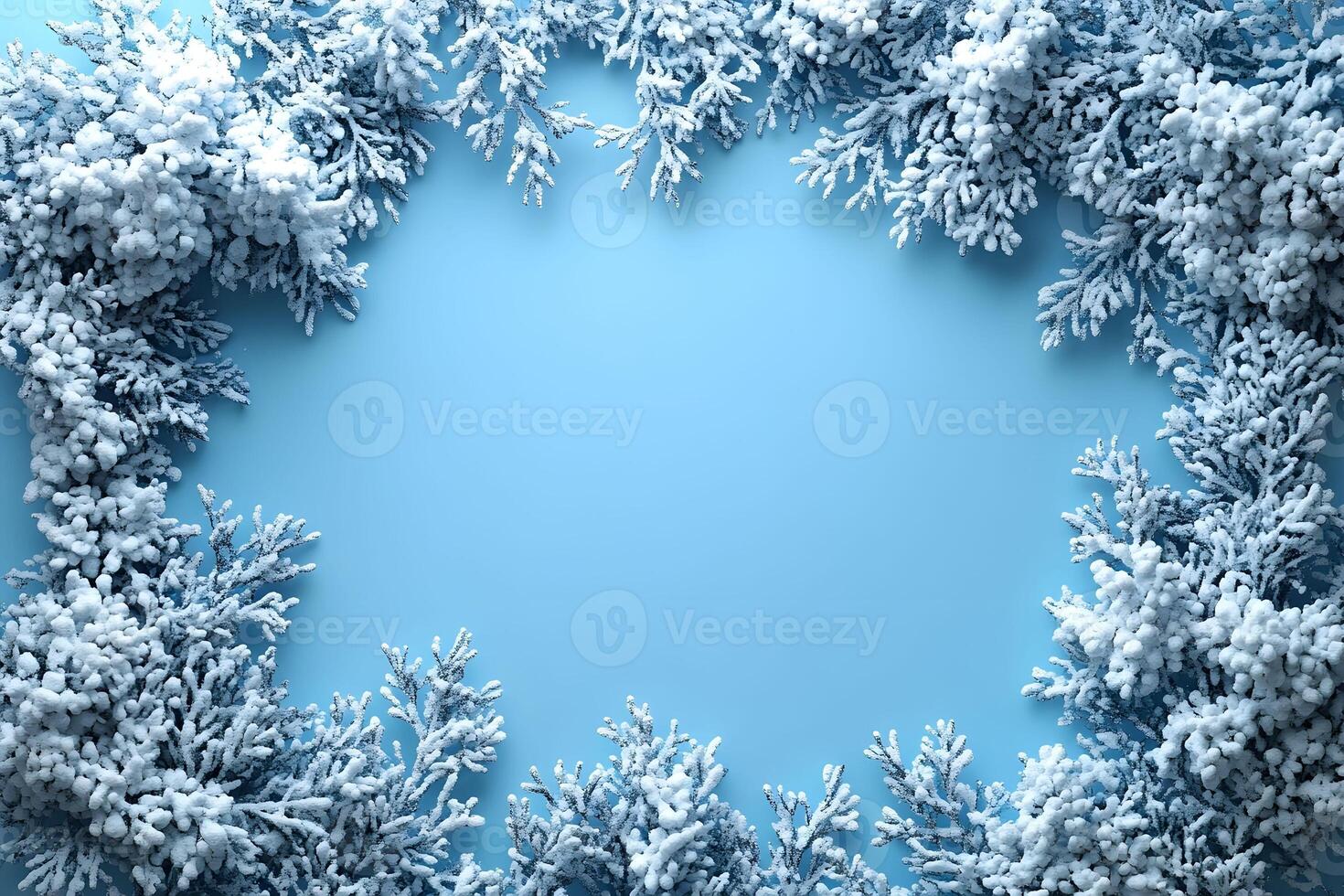 Frosty Winter Frame with Snow-Covered Pine Branches for Holiday Designs photo