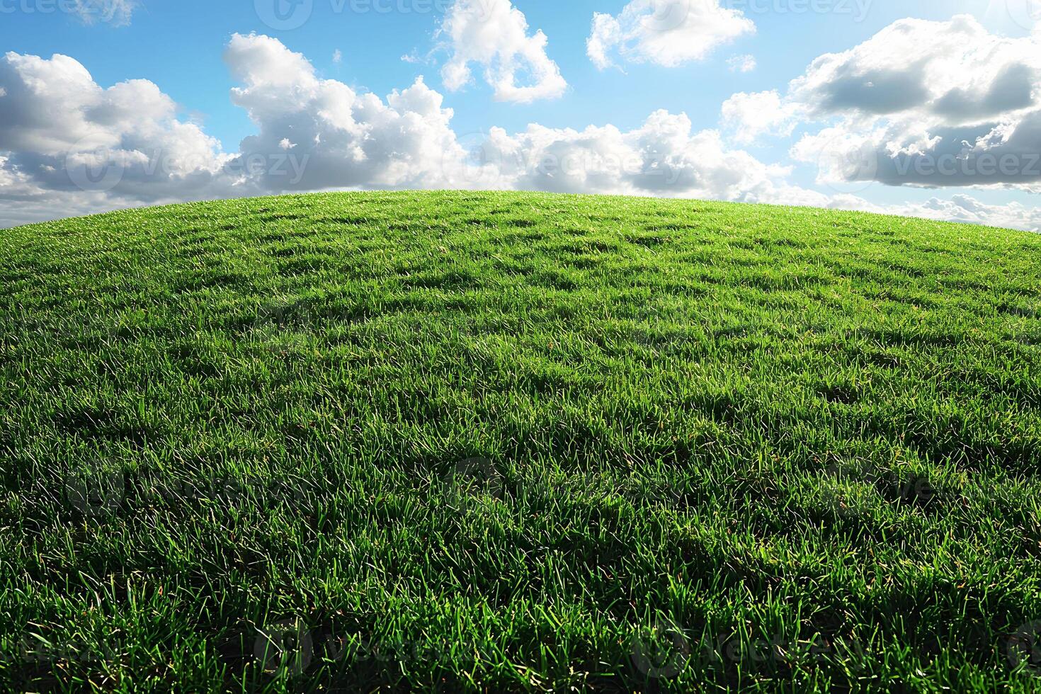 Idyllic Green Hill Under Blue Sky with Fluffy Clouds for Nature and Landscape Design photo
