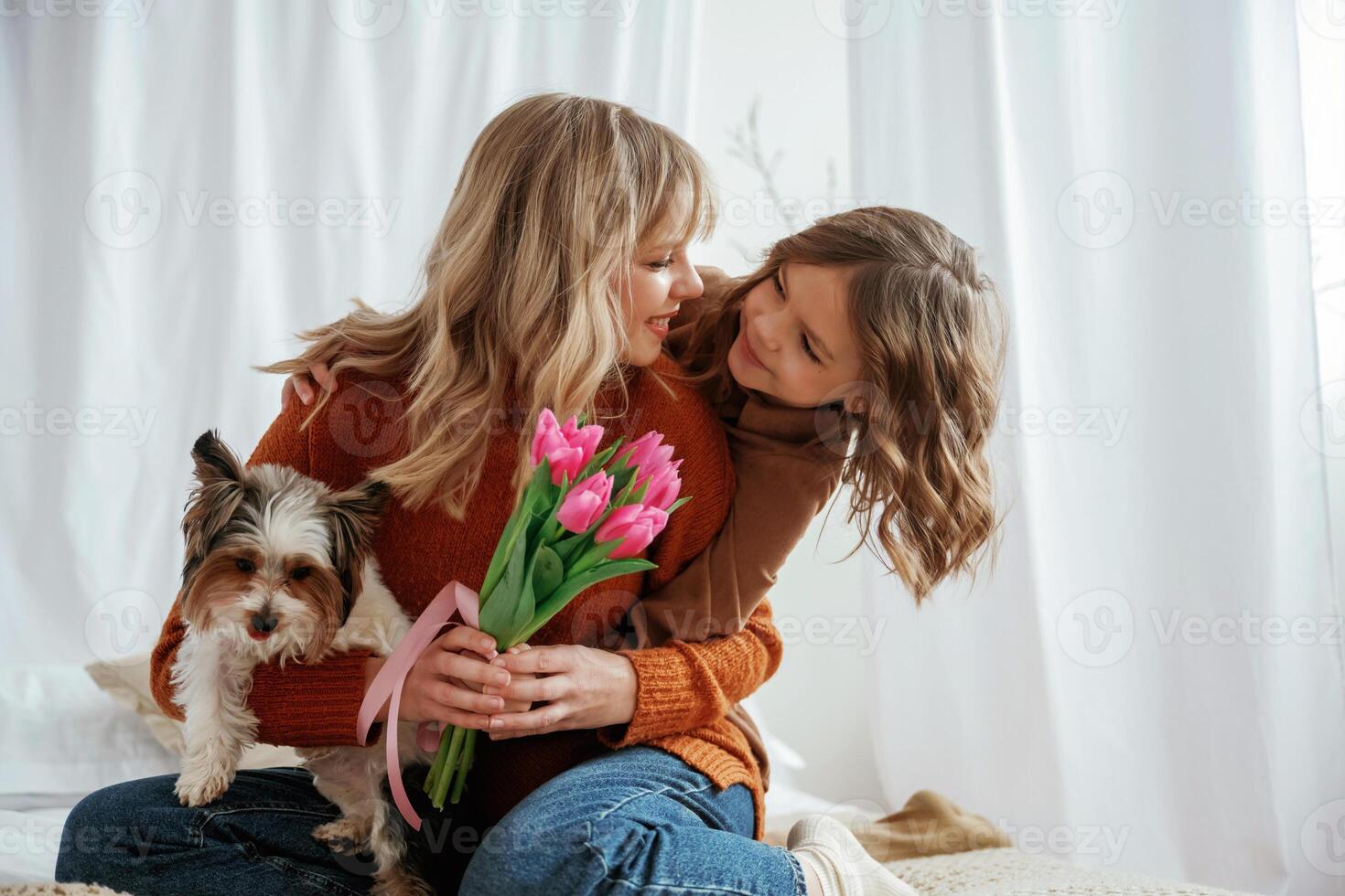Holding, flowers, for mother's day holiday, embracing, with dog. Parent with daughter at home photo