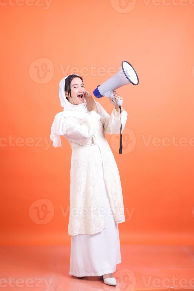 Empowered voice, Woman using megaphone, embodying influence and photo