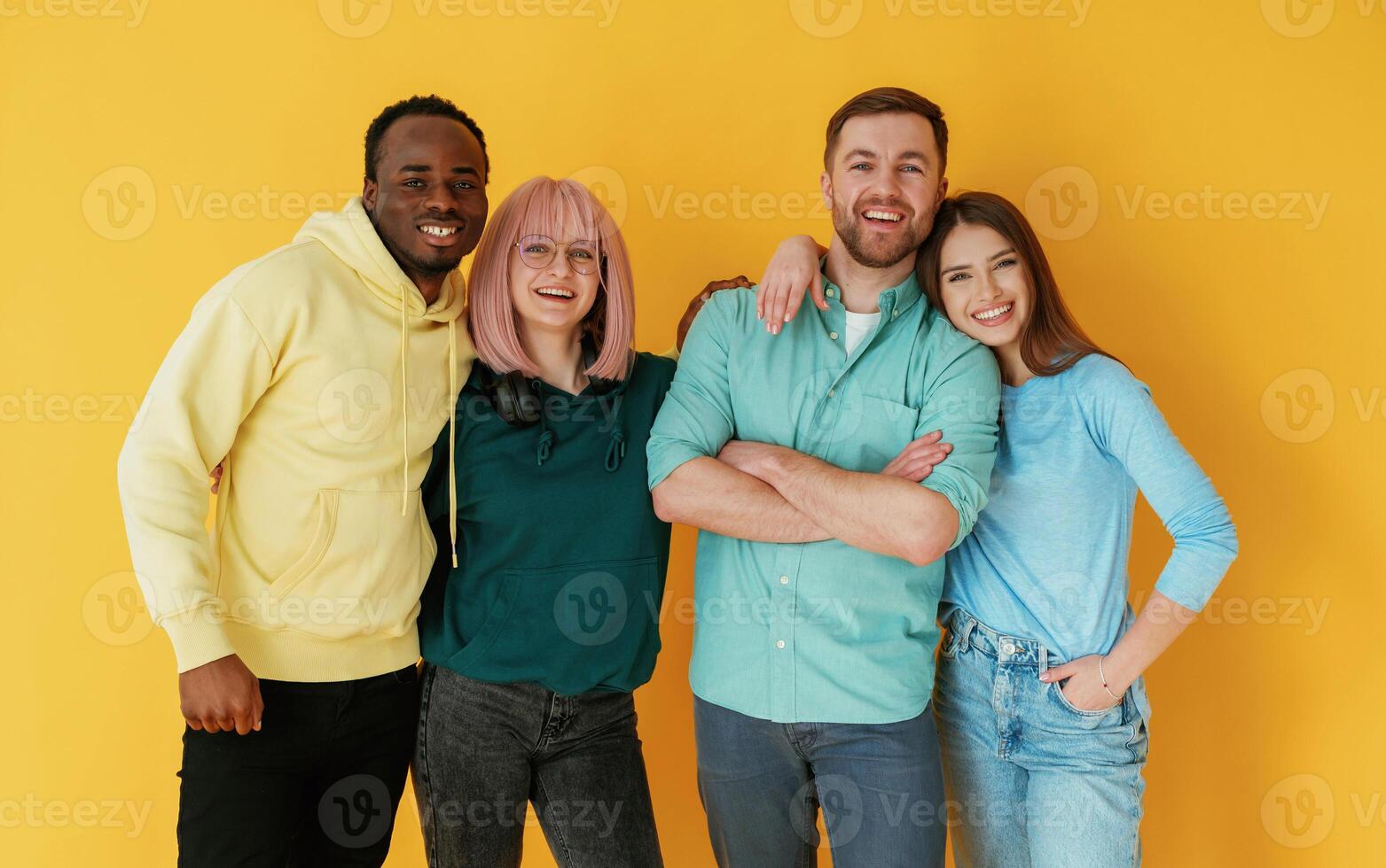 Front view... Group ,of, friends are in the studio against background photo
