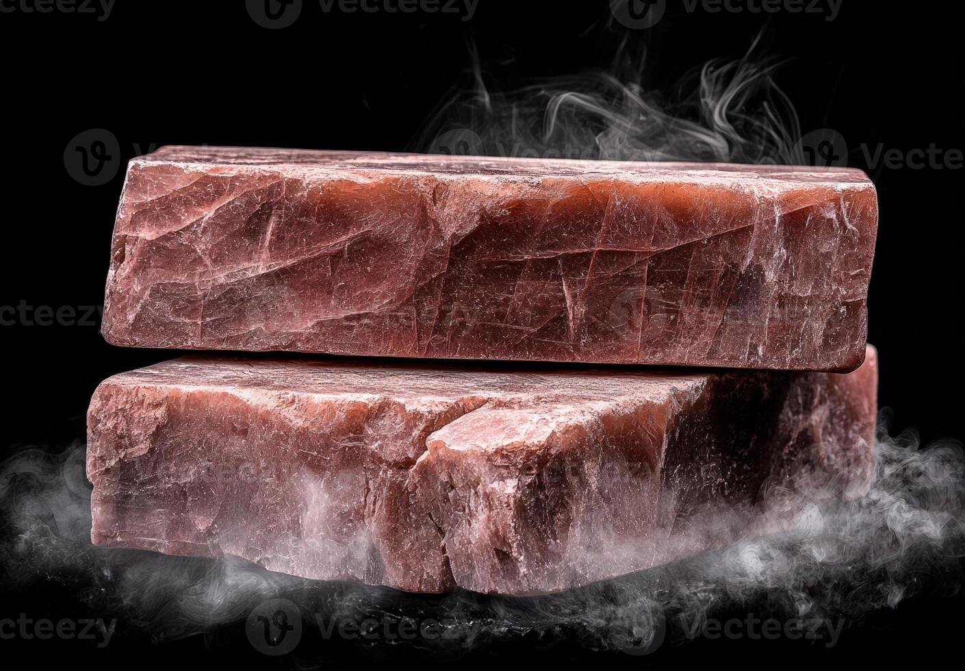 Two blocks of pink salt with steam photo