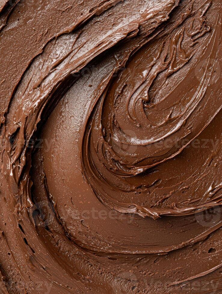 Swirls of rich chocolate frosting. photo