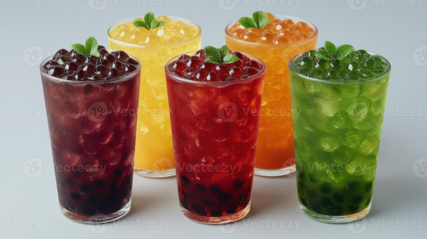 A collection of five colorful bubble tea drinks with tapioca pearls. photo