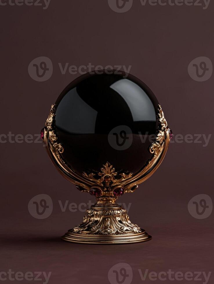 Ornate golden egg with ruby gems on brown background photo