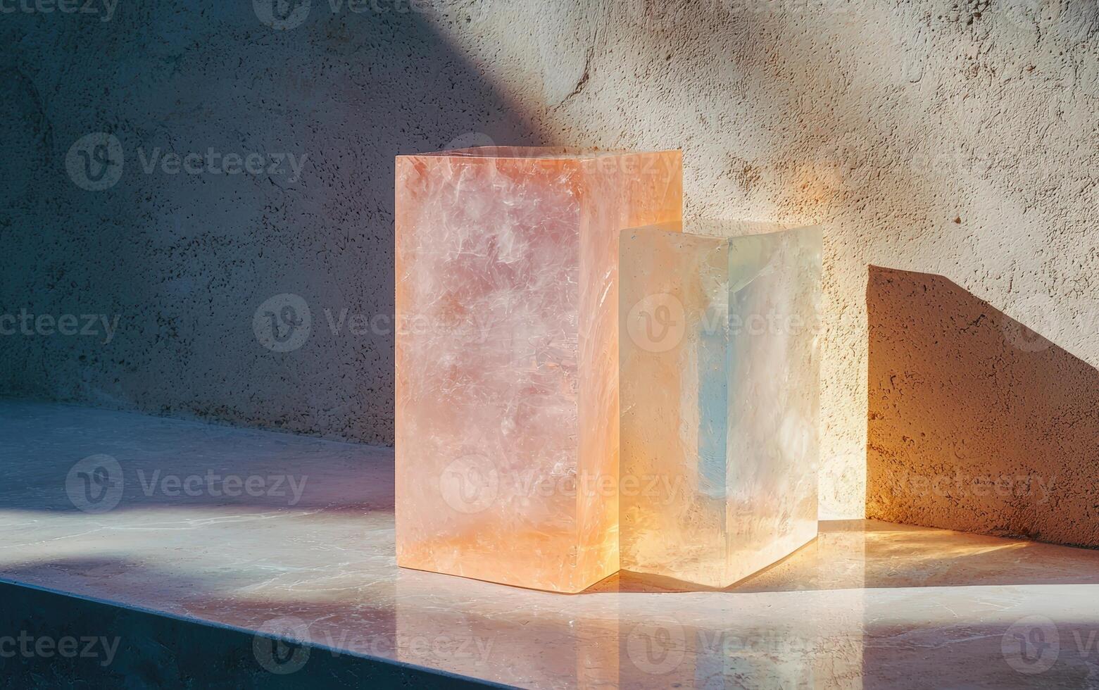 Illuminated translucent crystal blocks cast shadows on surface photo
