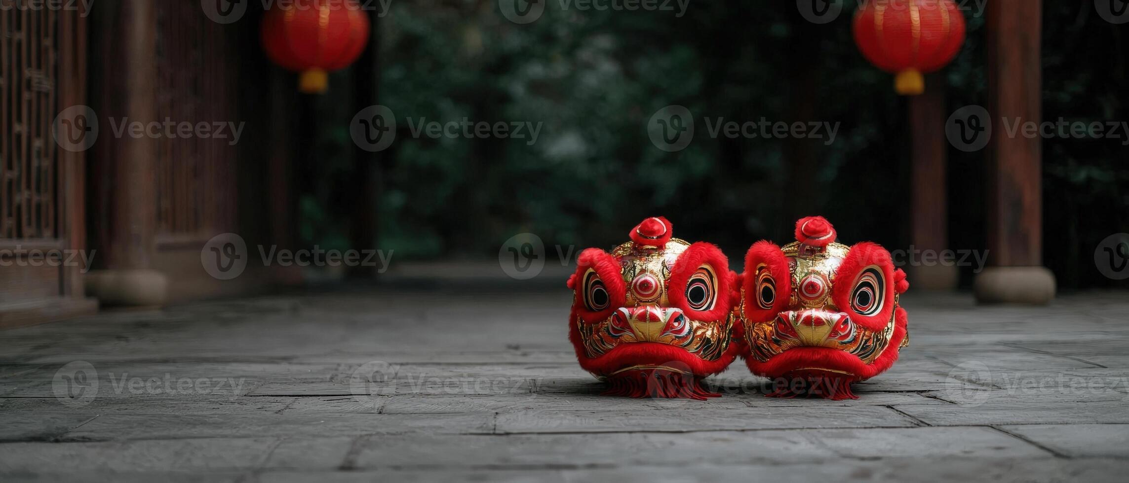 Two vibrant lion dance heads on a stone path photo