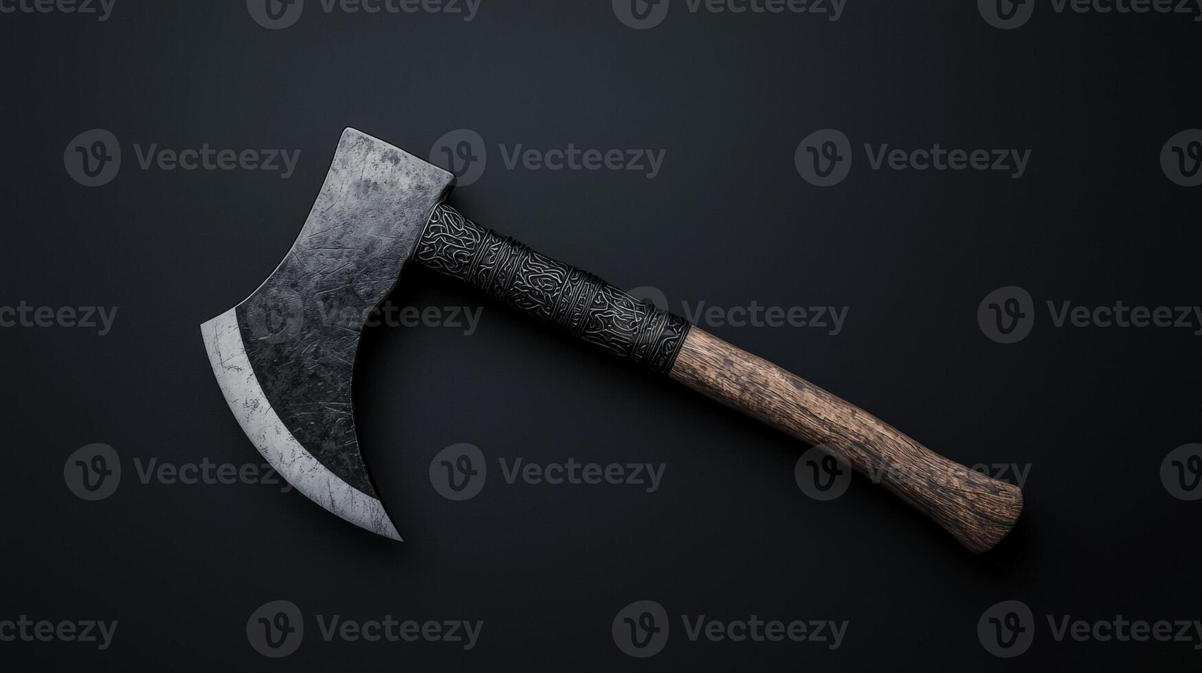 Menacing viking battle axe with ornate handle detail photo