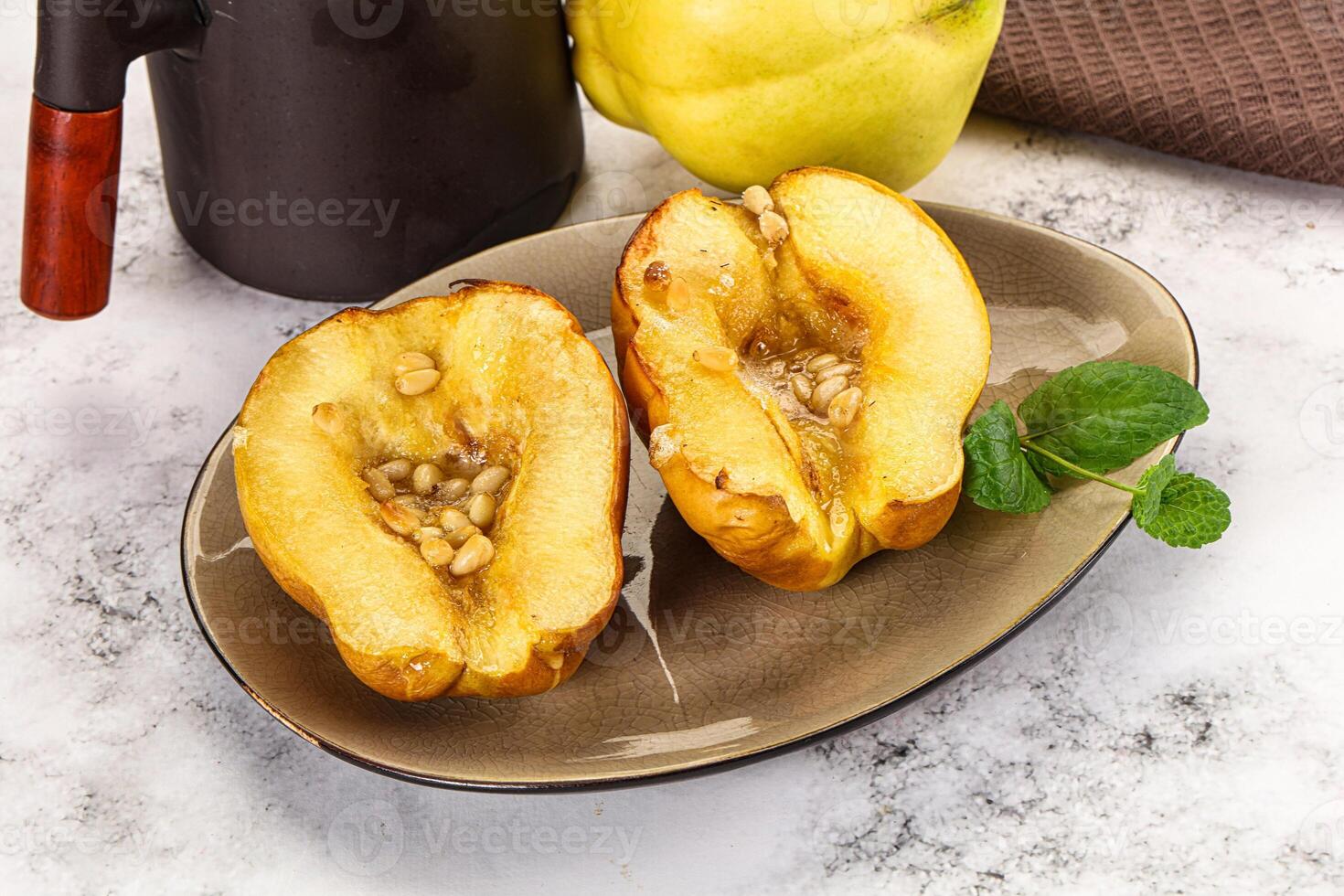 A plate with two halves of a fruit on it photo