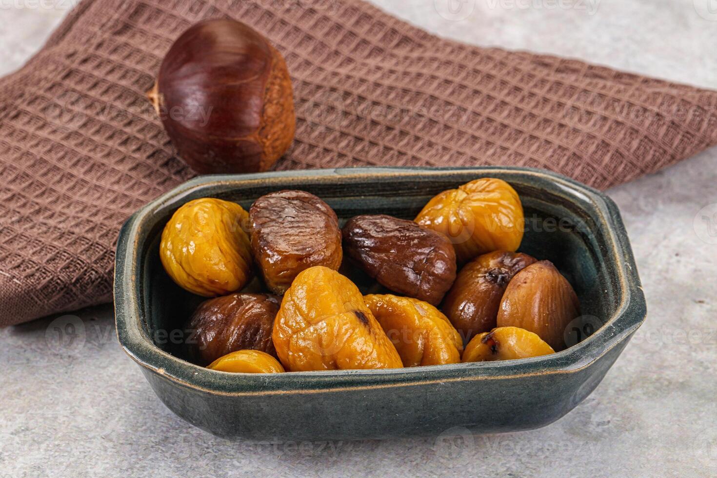 A bowl filled with dried dates and nuts photo