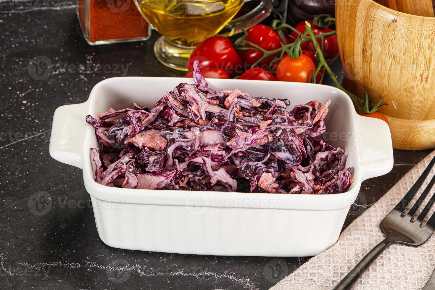 A white dish with red cabbage in it photo