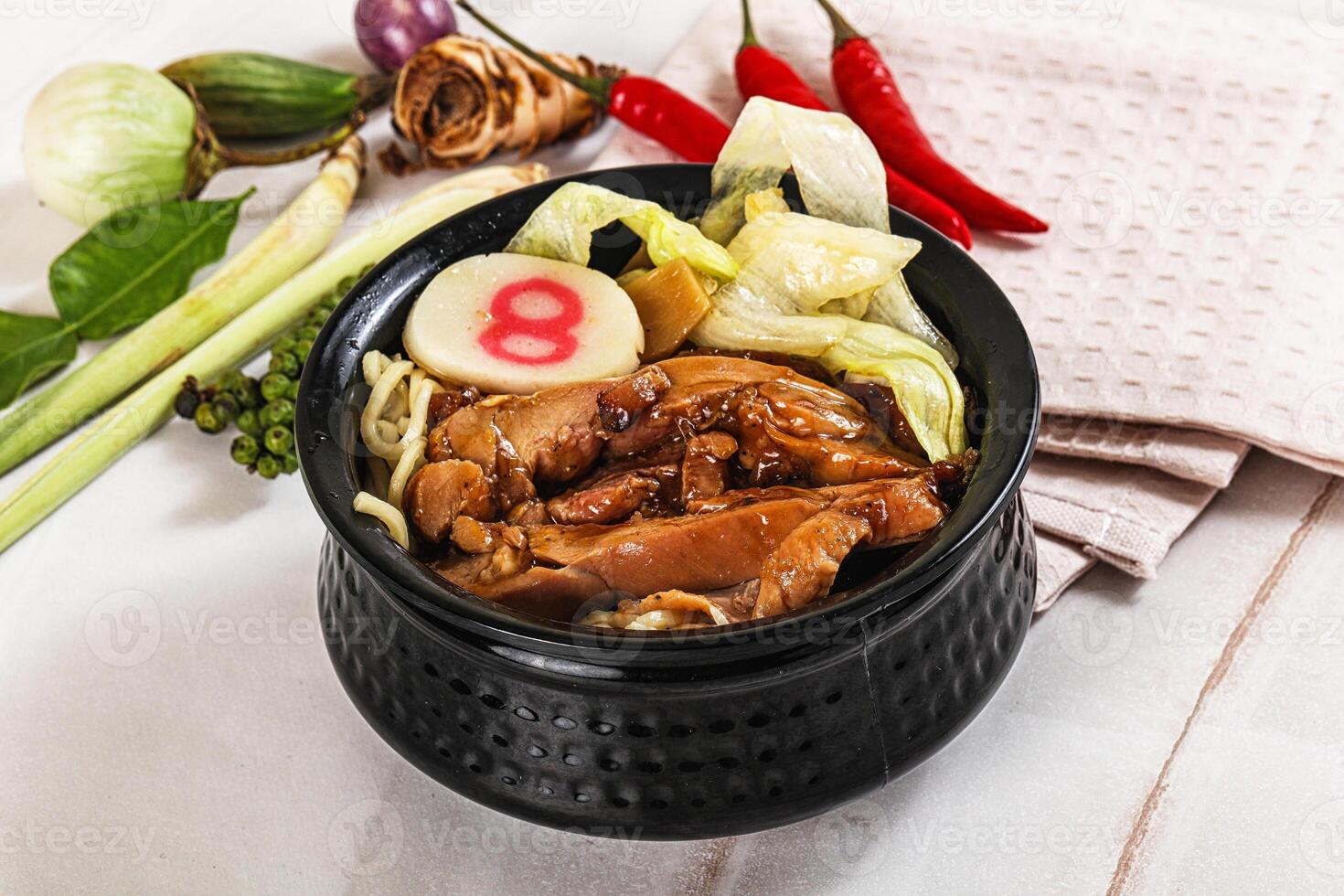 A bowl of food with a number eight on it photo