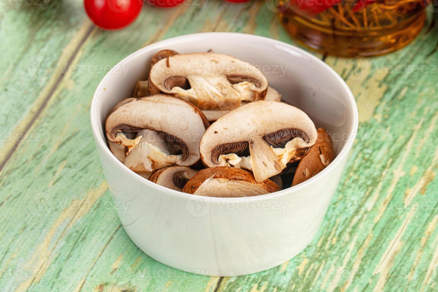 Sliced raw brown royal champignon photo