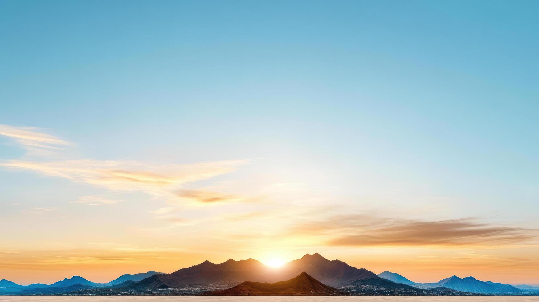 A beautiful sunset over the ocean with mountains in the background photo