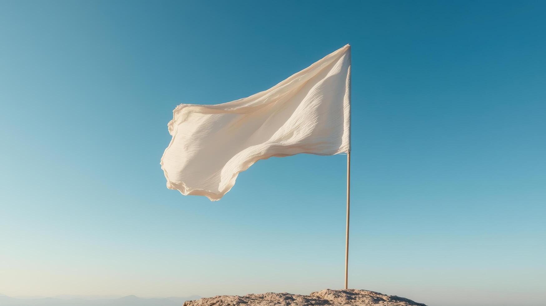 White flag on top of mountain photo