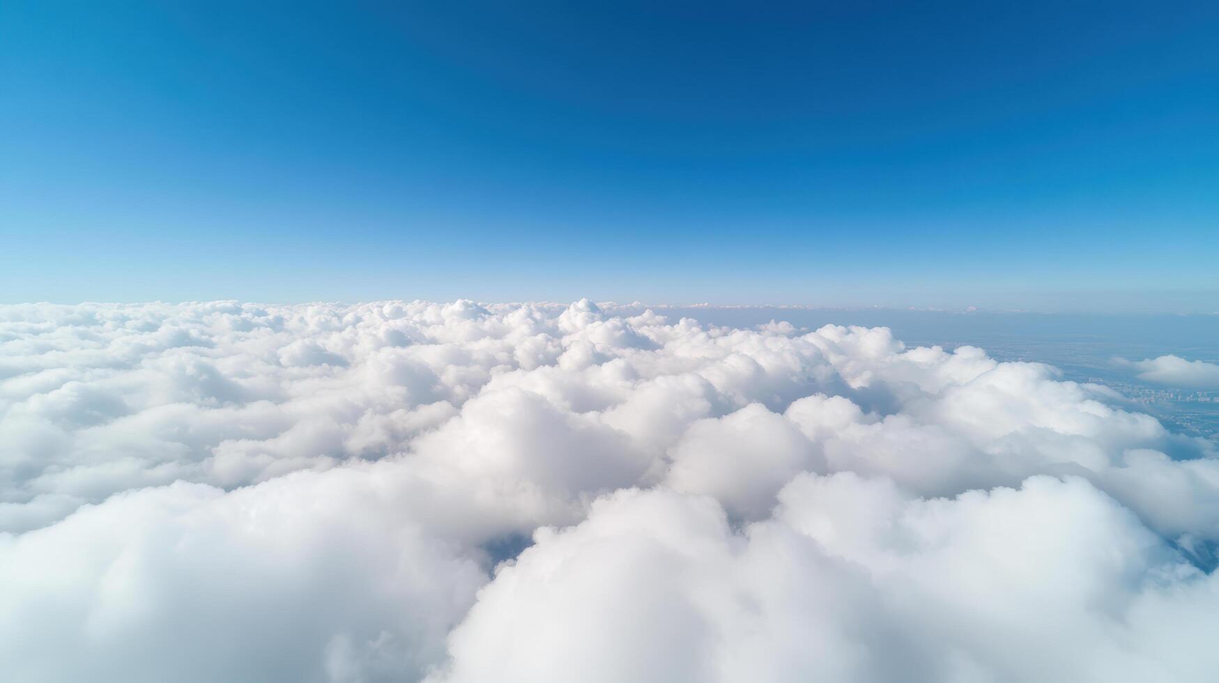 An aerial view of clouds from an airplane photo