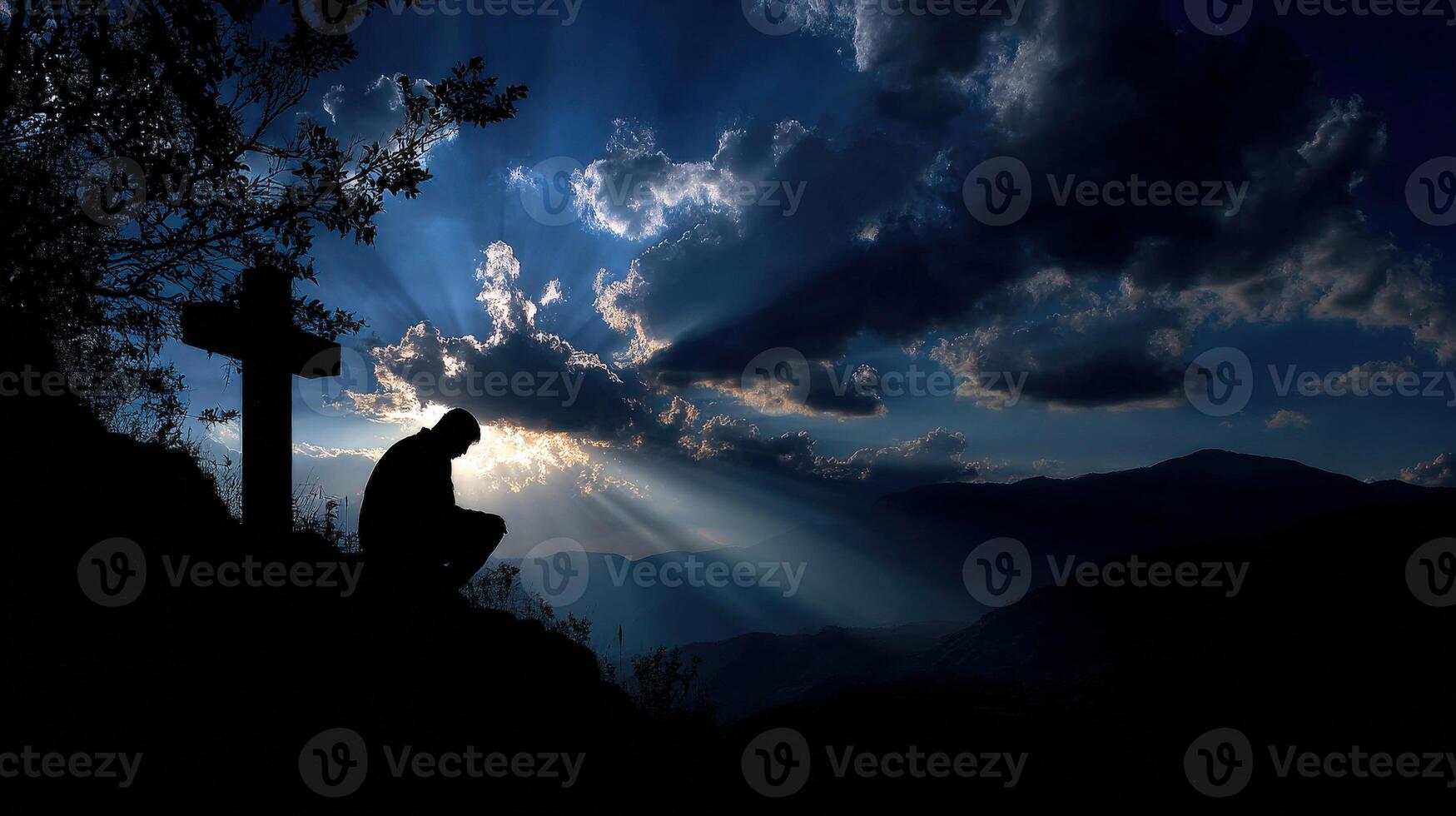 Solitary figure in contemplation against a dramatic sky at dusk photo