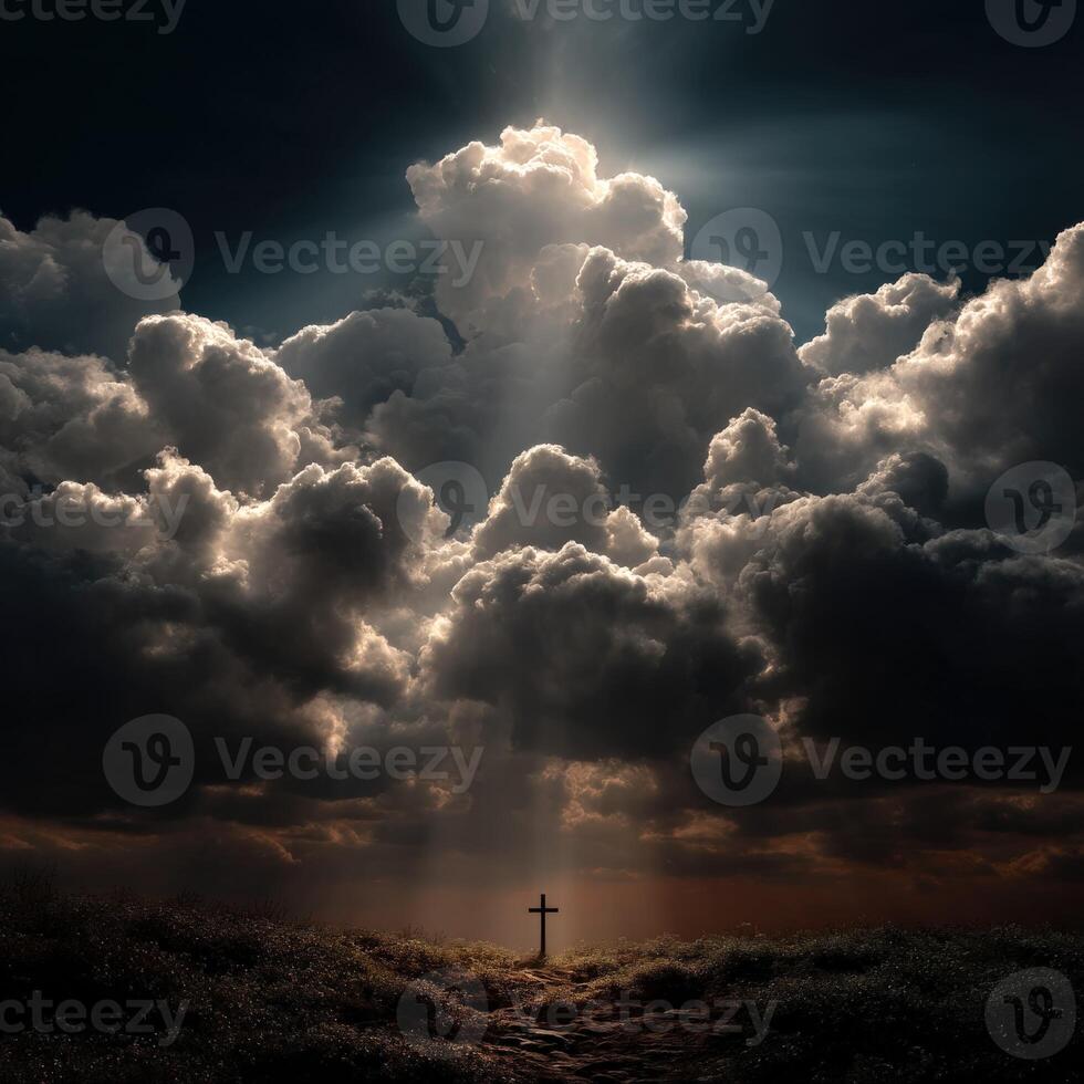 Cross illuminated by dramatic clouds at twilight photo