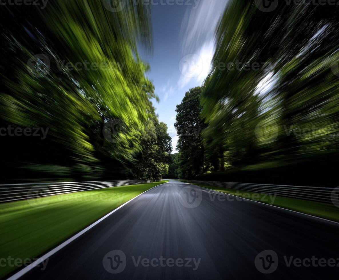 Racing through a twisting road surrounded by lush trees photo