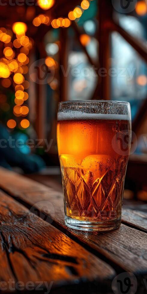 Golden beer with bubbles in a cozy setting photo