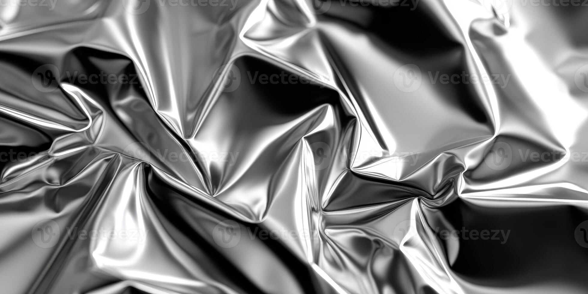 Silvery crumpled texture seen up close in abstract form photo