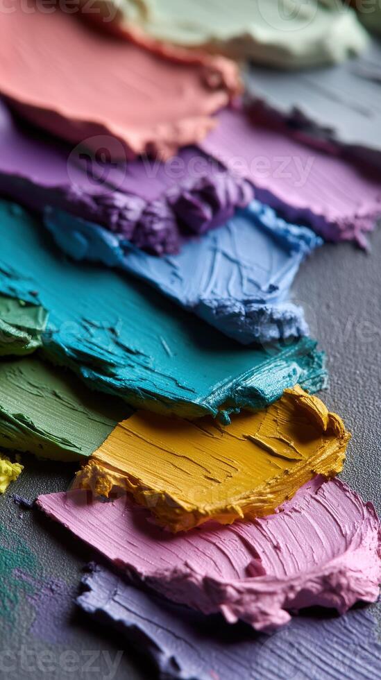 Colorful palette of paint textures on canvas surface photo