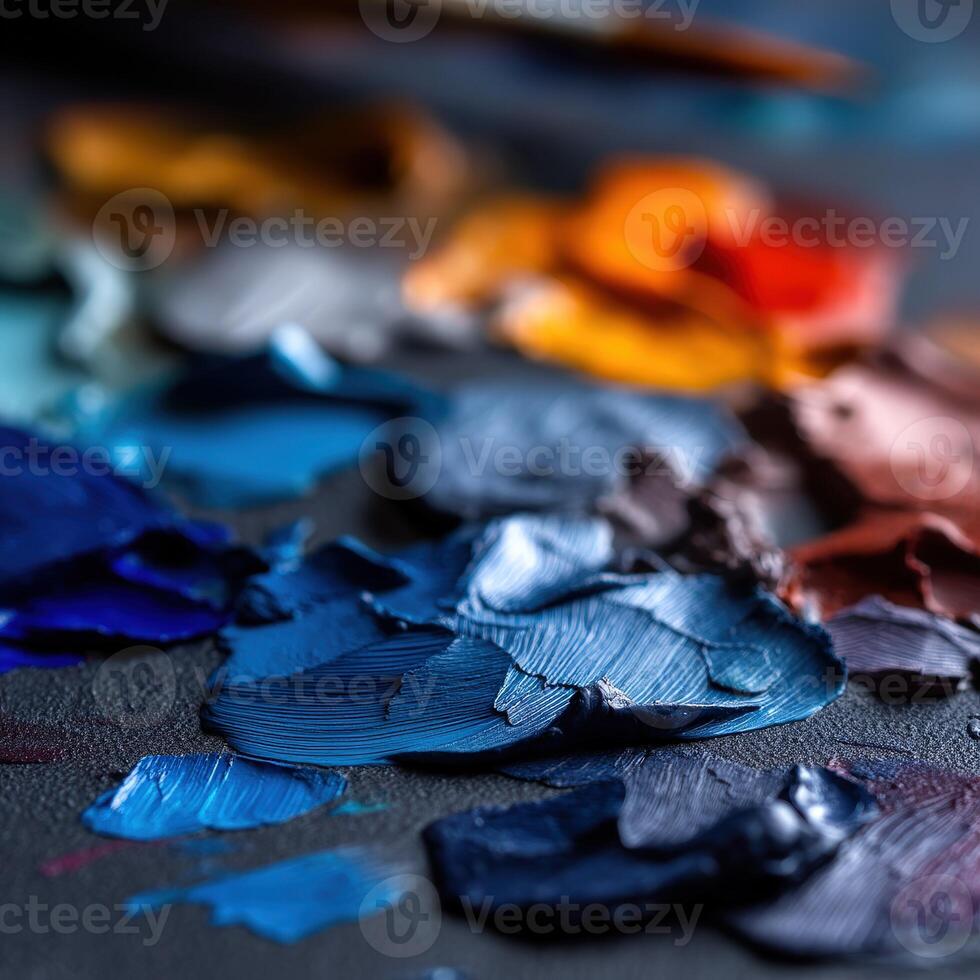 Colorful palette of oils at an artist's studio table photo