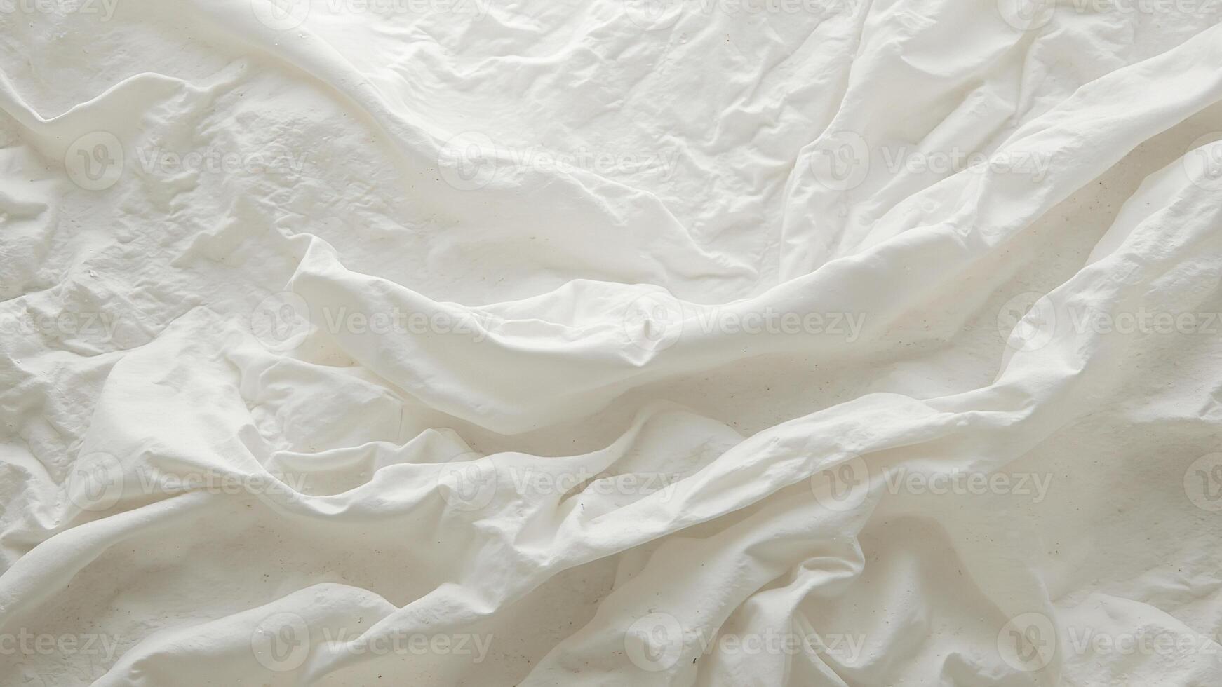 Soft White Fabric with Natural Texture and Elegant Flowing Drapes photo