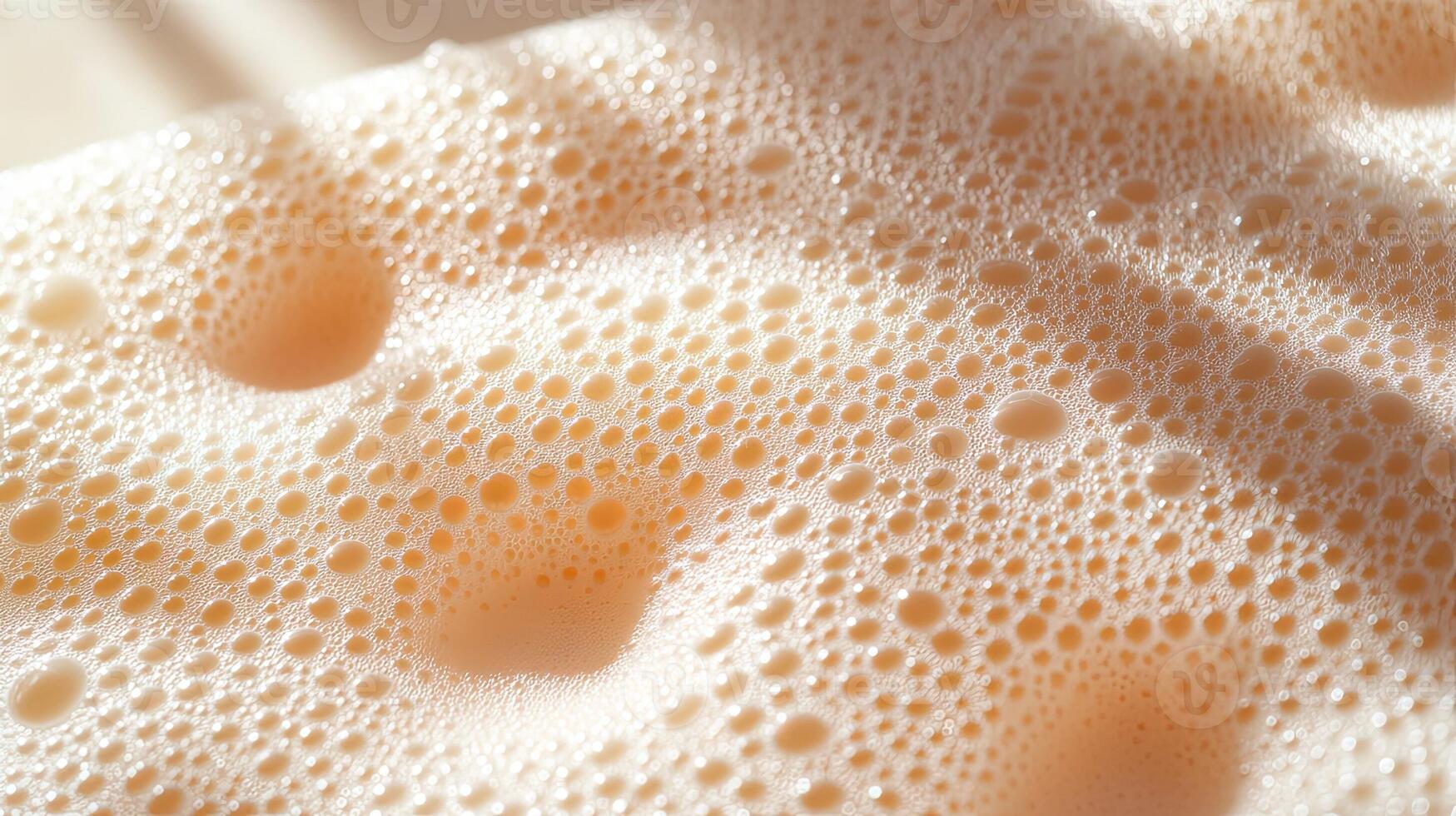 A close up of a soap bar with bubbles photo