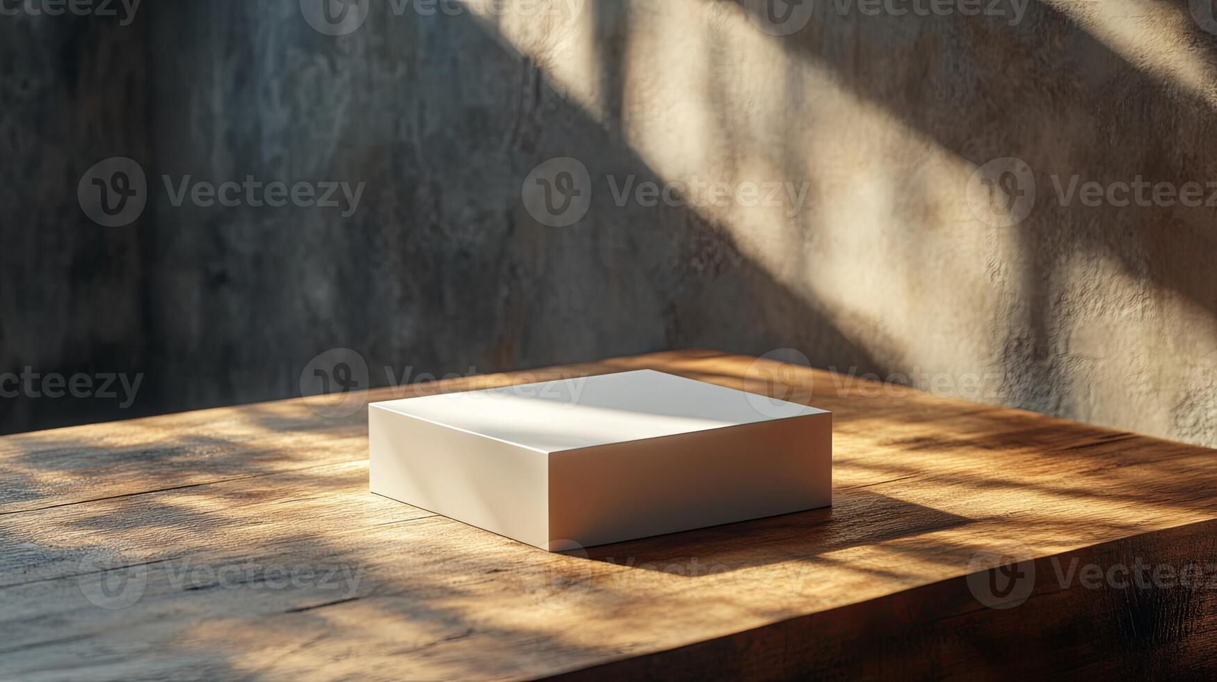 A white box sitting on a wooden table photo