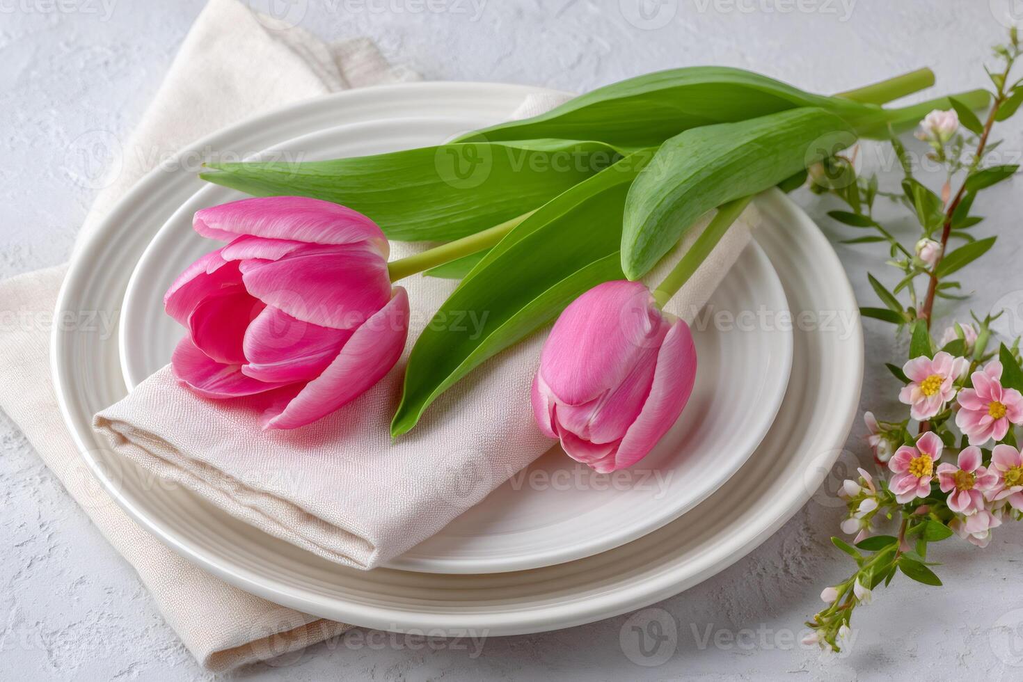 Festive table setting with pink tulips and linen napkin photo