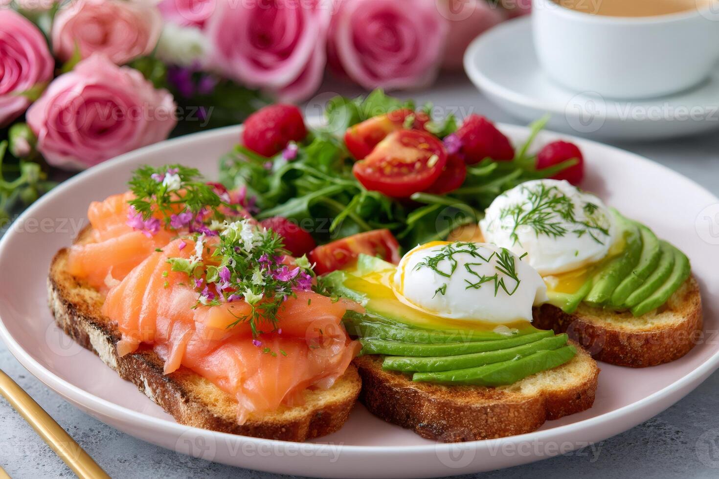 Delicious breakfast with poached eggs, smoked salmon, avocado toast and salad photo