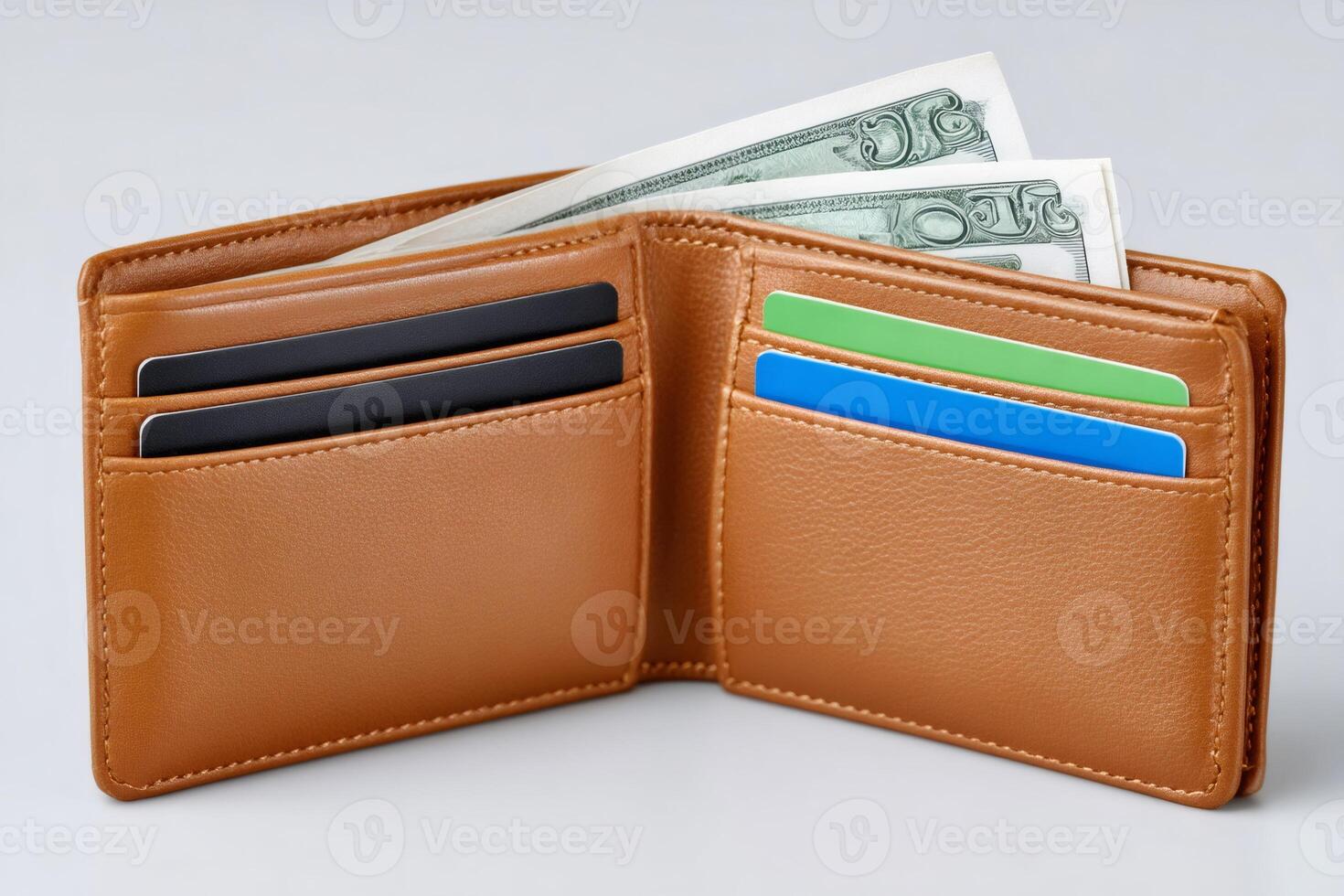 Brown leather wallet with US Dollar banknotes and credit cards showing photo