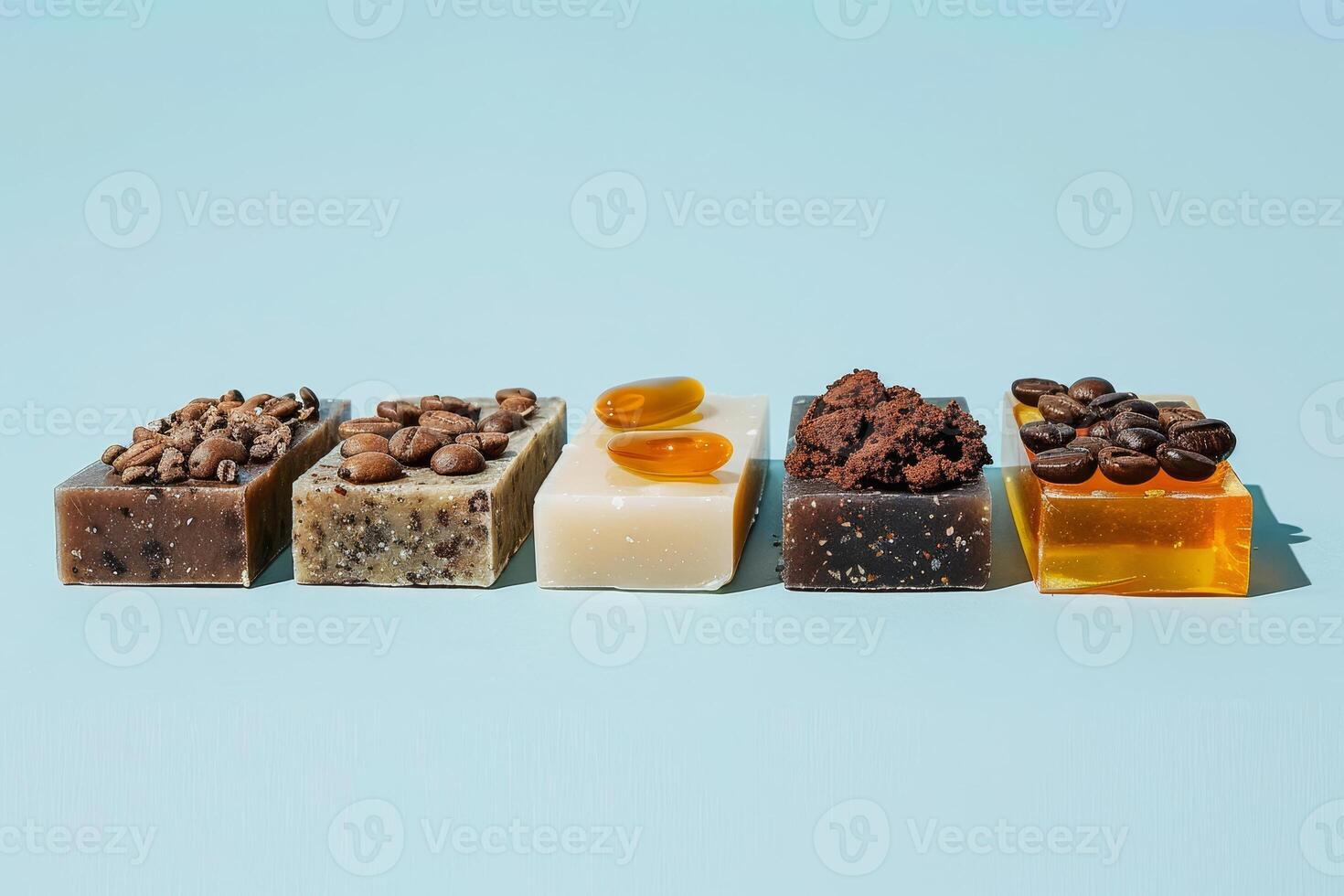 Different types of artisanal soaps displayed harmoniously, showcasing varying colors, textures, and ingredients on a light blue backdrop photo