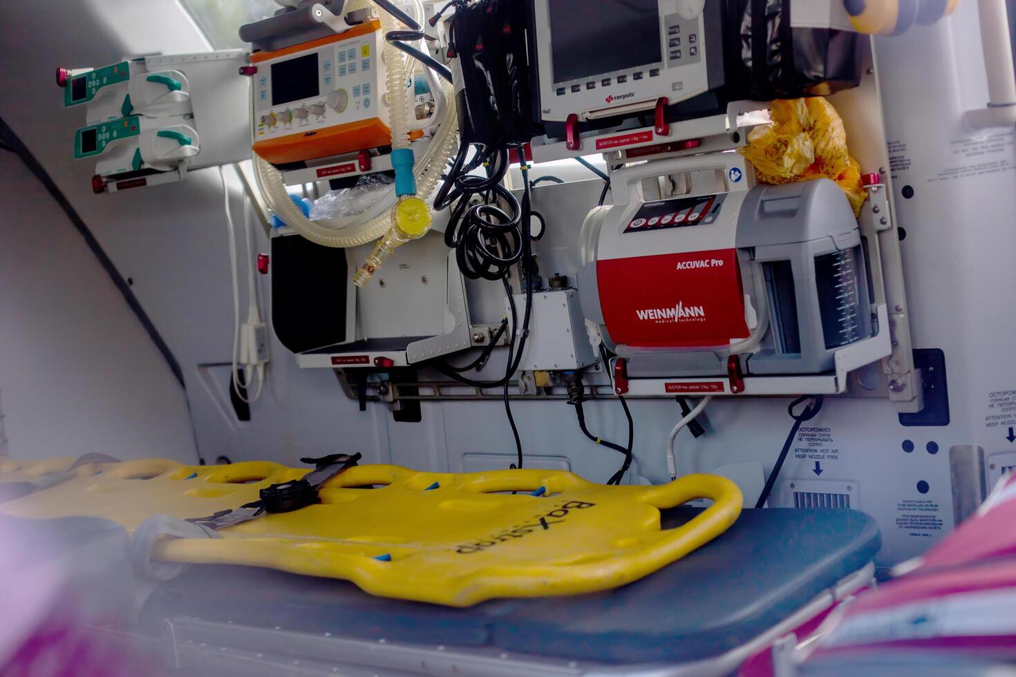 Moscow, Moscow region, Russia - 03.09.2023.An inside view of an ambulance helicopter with modern life support devices and a spinal platform photo
