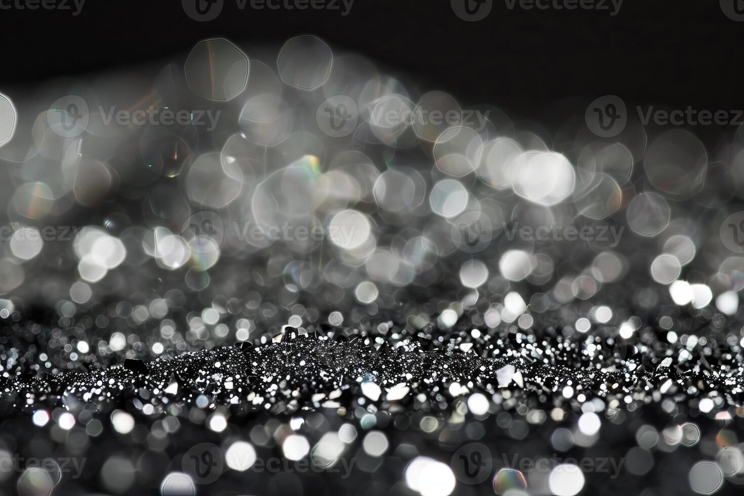 Sparkling silver and black bokeh abstract background with blurred lights photo