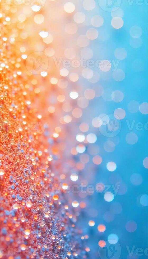 An abstract background with orange glitter on the left and blue bokeh on the right, creating a vibrant and sparkling effect photo