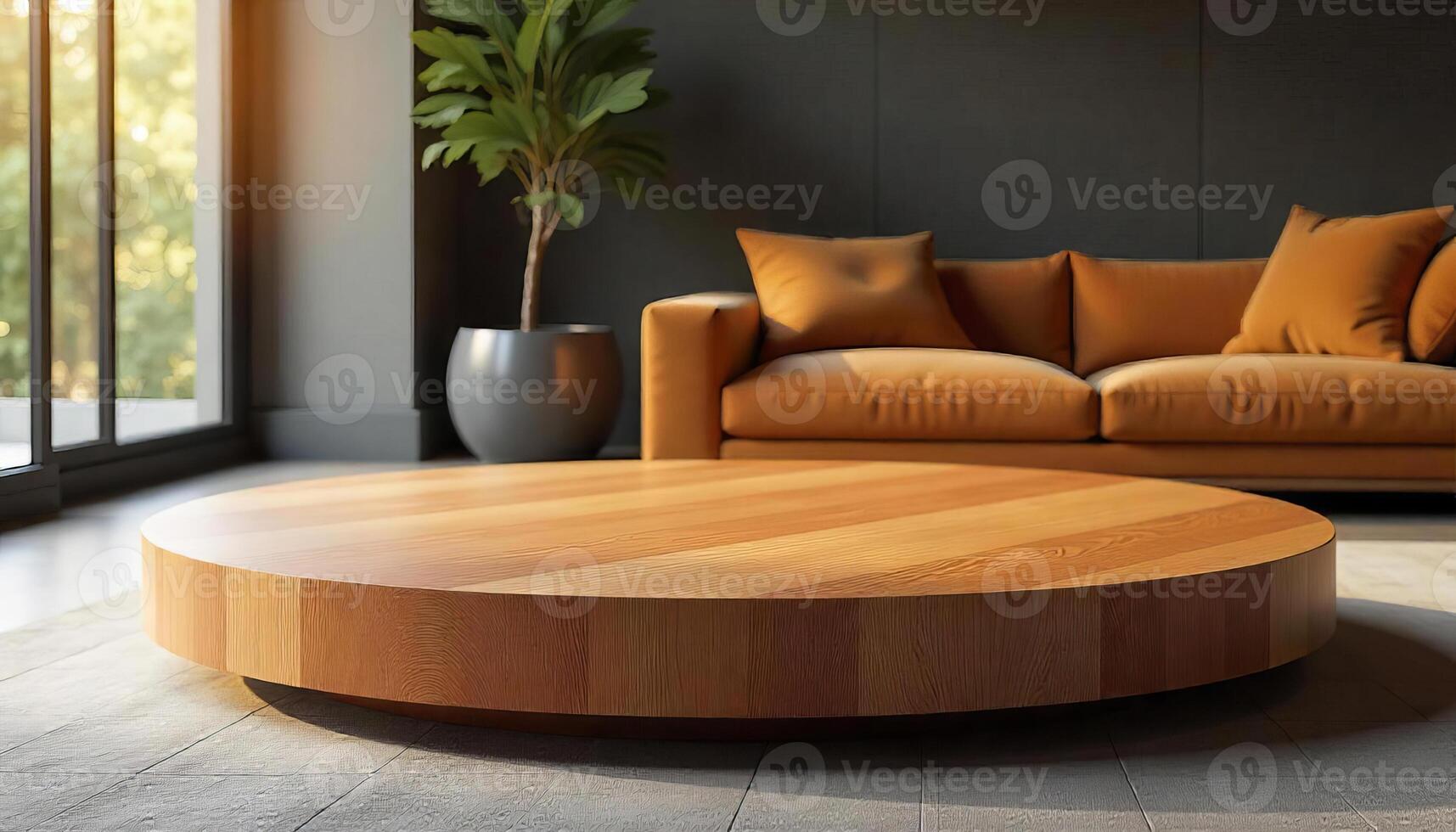 A wooden round table in a living room with a yellow sofa and a plant pot photo
