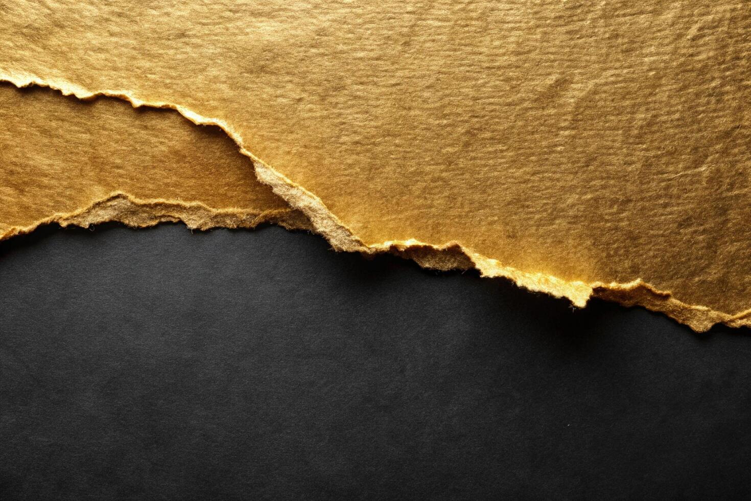 Elegant Torn Gold Paper over Dark Background for Business and Design Use photo