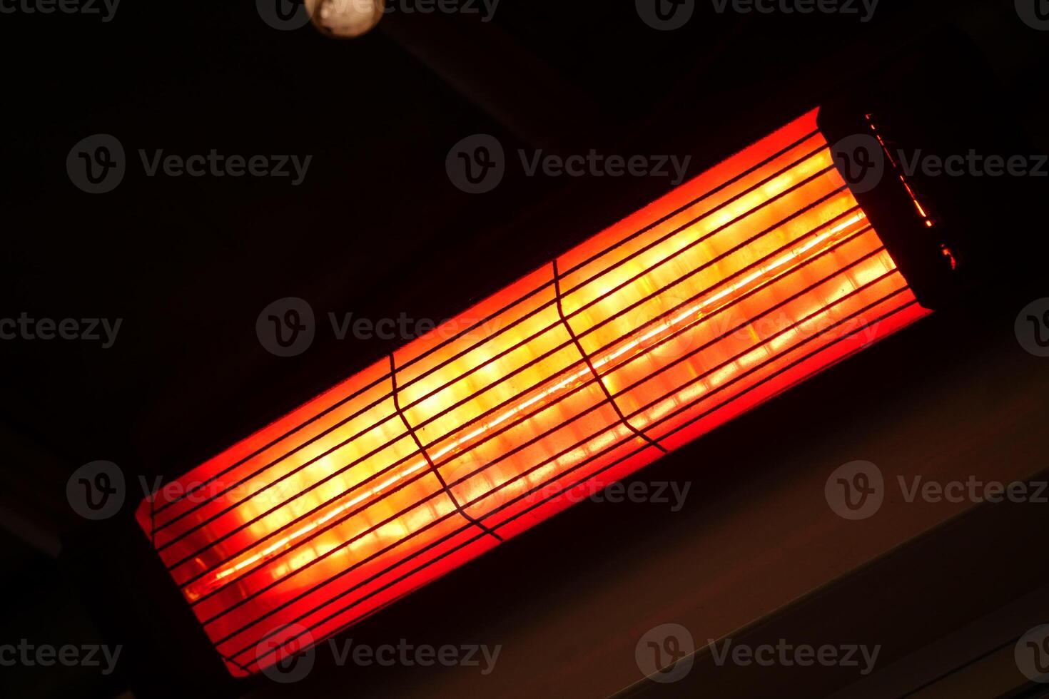Bright heater radiating warmth in a cozy indoor space photo