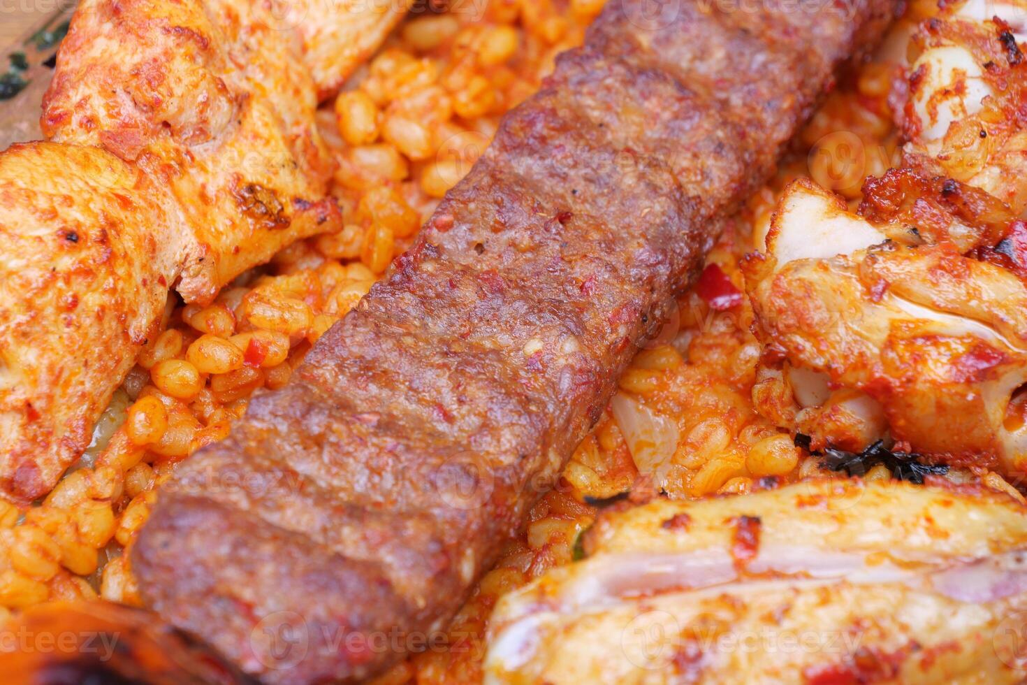 Turkish Traditional Sish Adana Urfa Kebab served with spiced rice photo