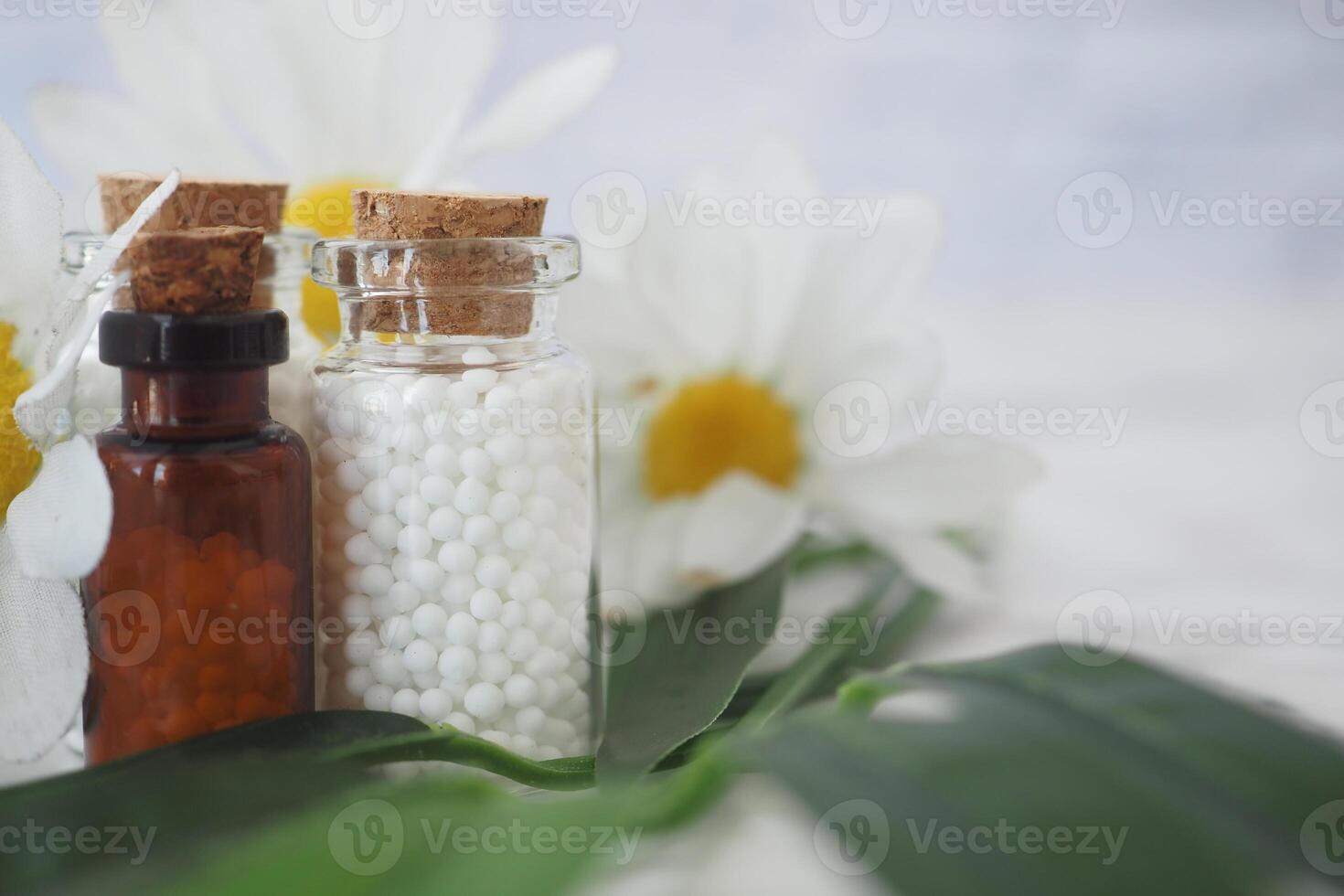 Homeopathy alternative medicine bottle on a table photo