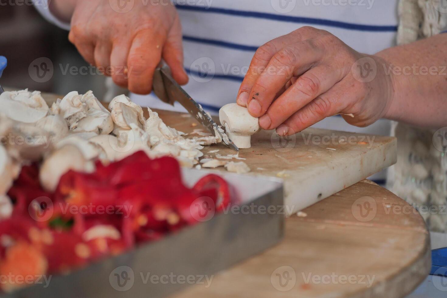 Preparing fresh vegetables for a meal in a cozy kitchen photo