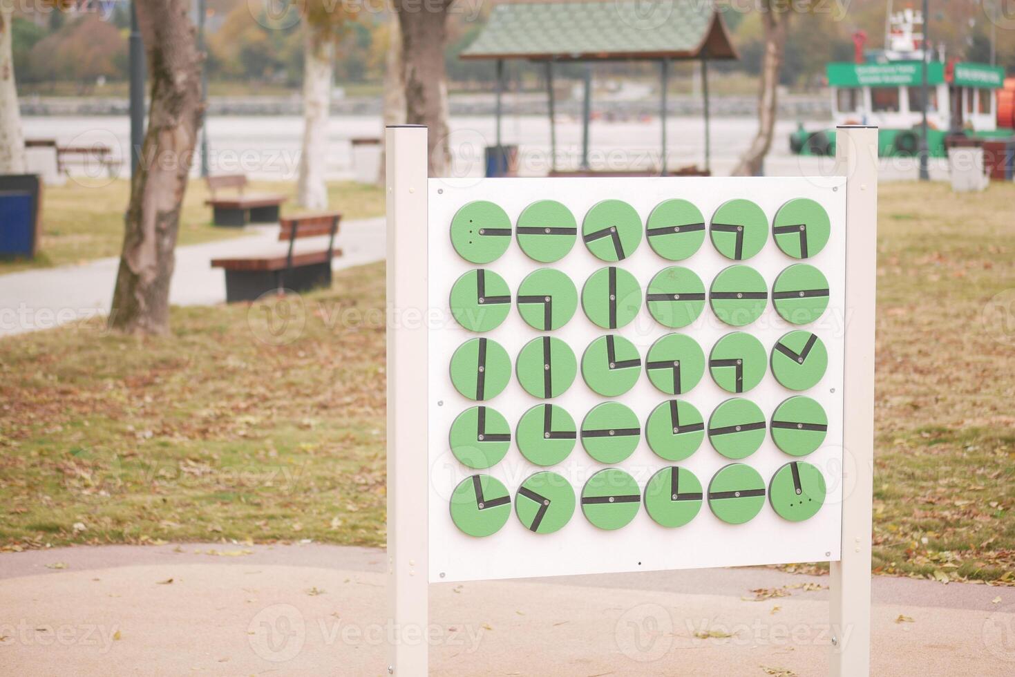 Creative clock display encourages time learning in park photo