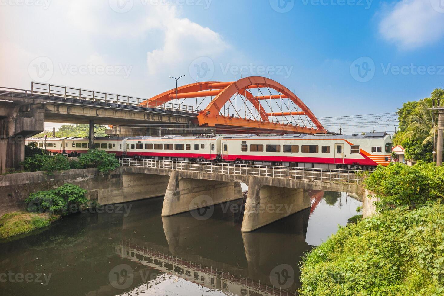 Heritage train pass the bridge at Rende, Tainan, taiwan photo