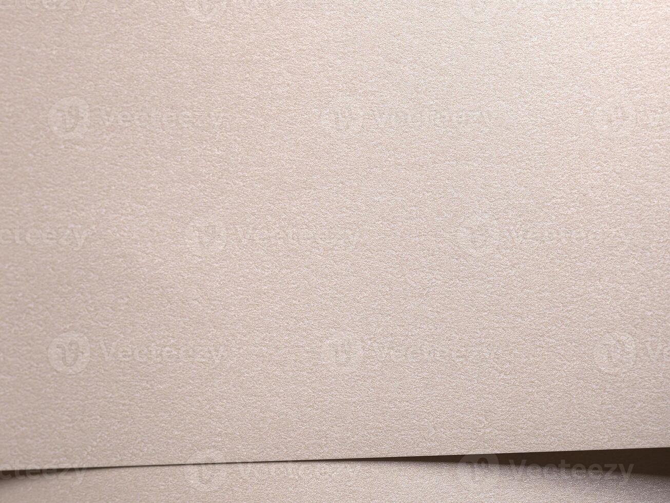 Paper background with satin matte texture. Layered soft overlap, pale gold and champagne tone, clean photo