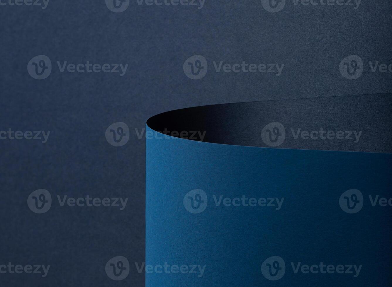 Matte designer paper texture, modern and minimalistic composition. Curved, cylindrical roll with photo