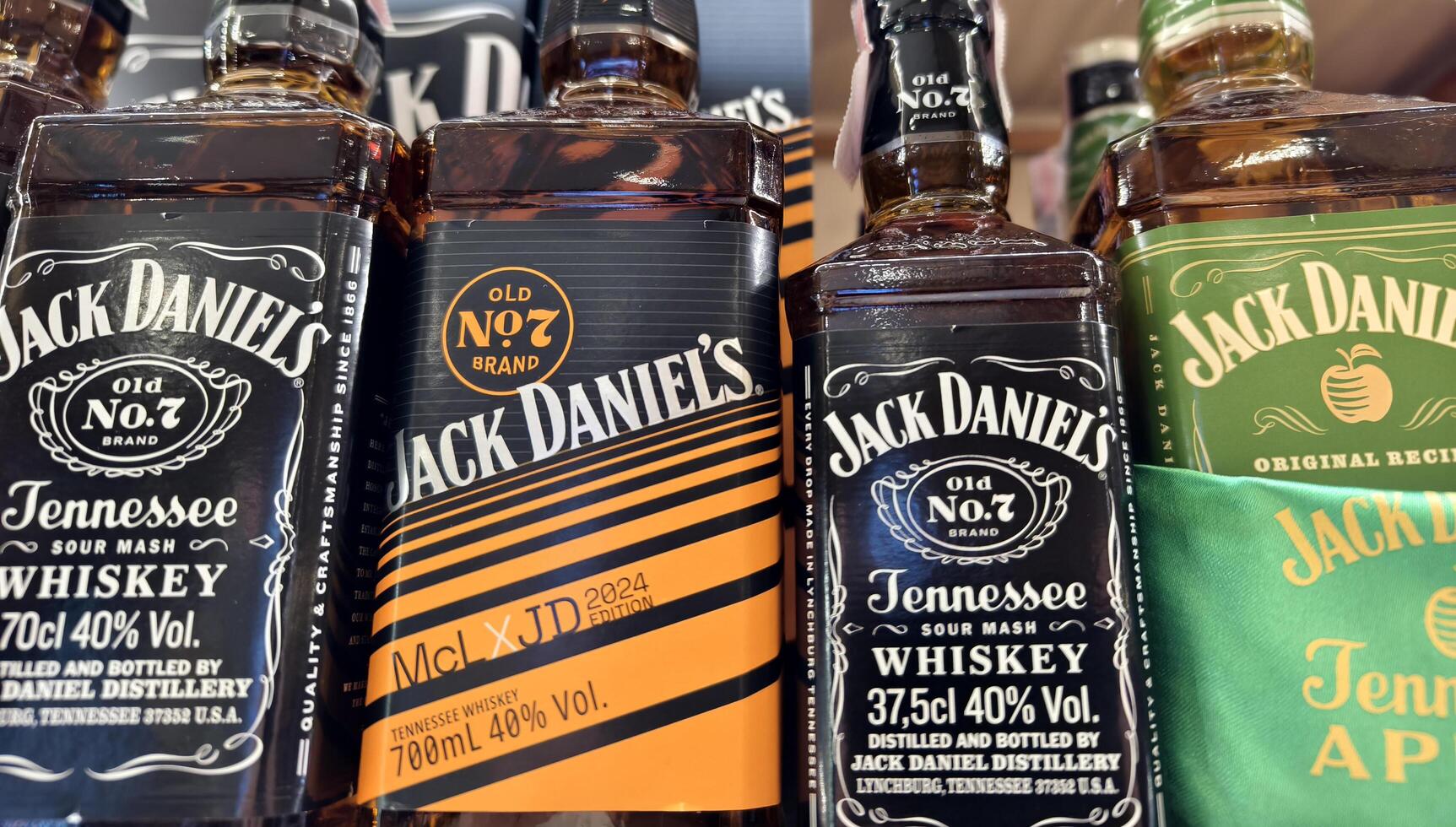PHUKET, THAILAND - MARCH 8, 2025. Bottles of whiskey Jack Daniels on a shelf in a supermarket photo