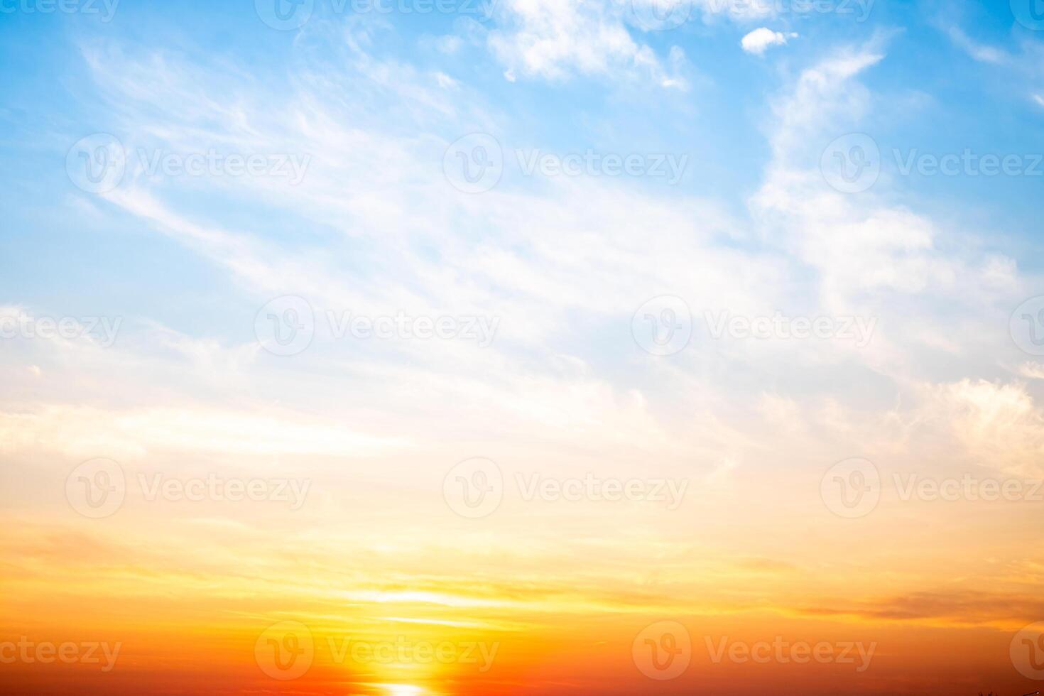 Beautiful , luxury soft gradient orange gold clouds and sunlight on the blue sky perfect for the background, take in evening,Twilight, Large size, high definition landscape . photo