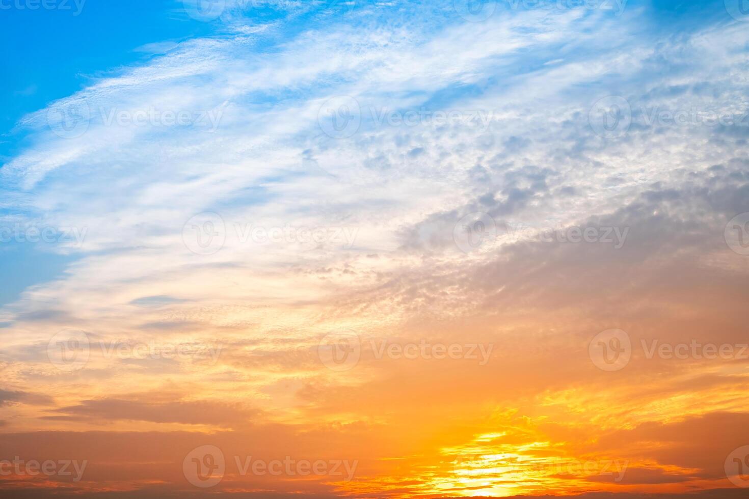 Beautiful , luxury soft gradient orange gold clouds and sunlight on the blue sky perfect for the background, take in evening,Twilight, Large size, high definition landscape pho. photo
